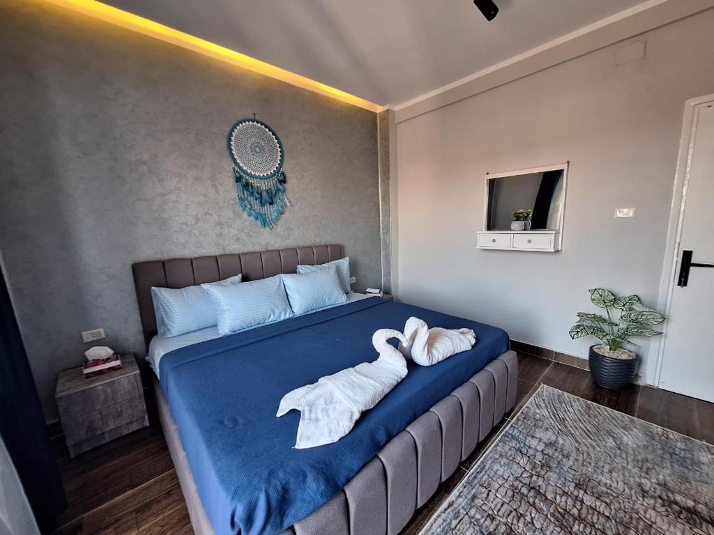 Postel nebo postele na pokoji v ubytování downtown Family Suites