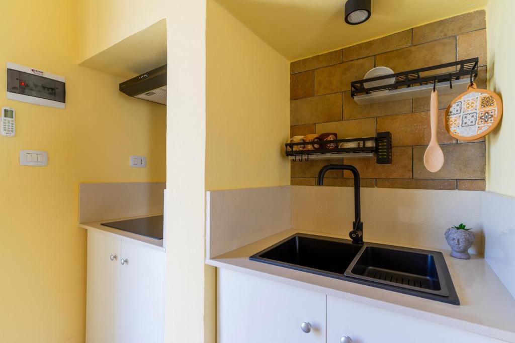 Kuchyň nebo kuchyňský kout v ubytování Casa donna Sofia