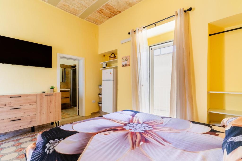 TV a/nebo společenská místnost v ubytování Casa donna Sofia