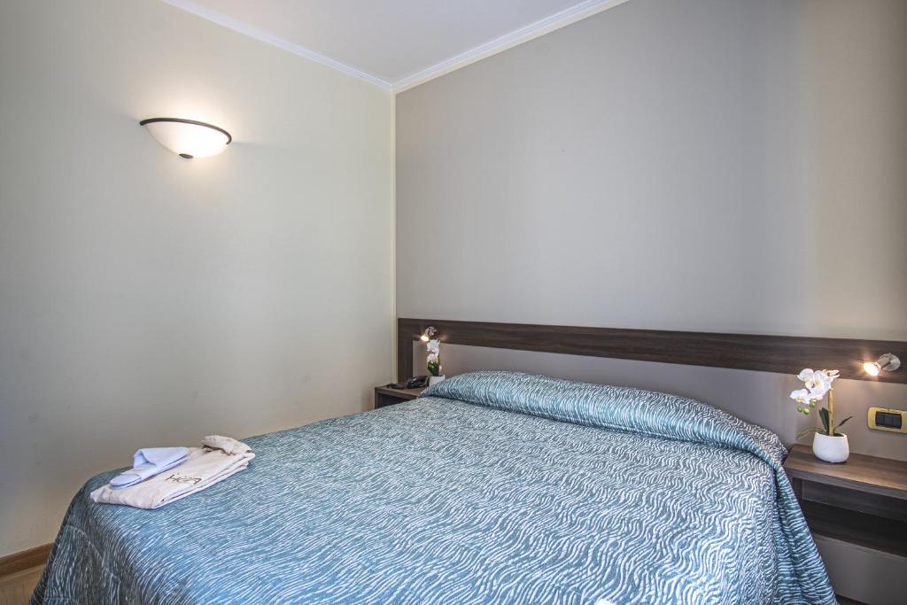 Кровать или кровати в номере Grande Albergo