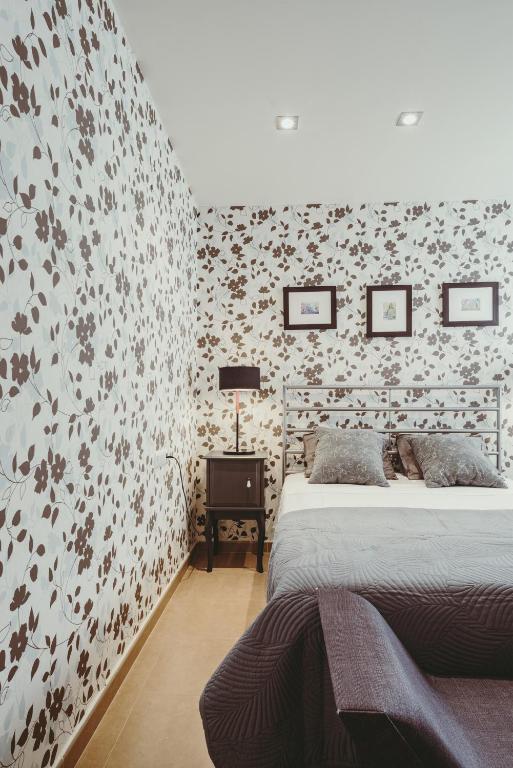A bed or beds in a room at El Gran Azul - Altea