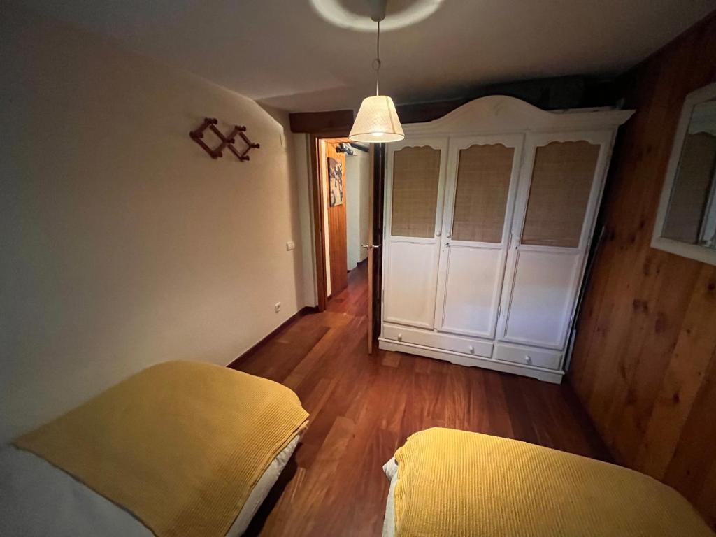 Postel nebo postele na pokoji v ubytování Apartamentos Casa Gemma