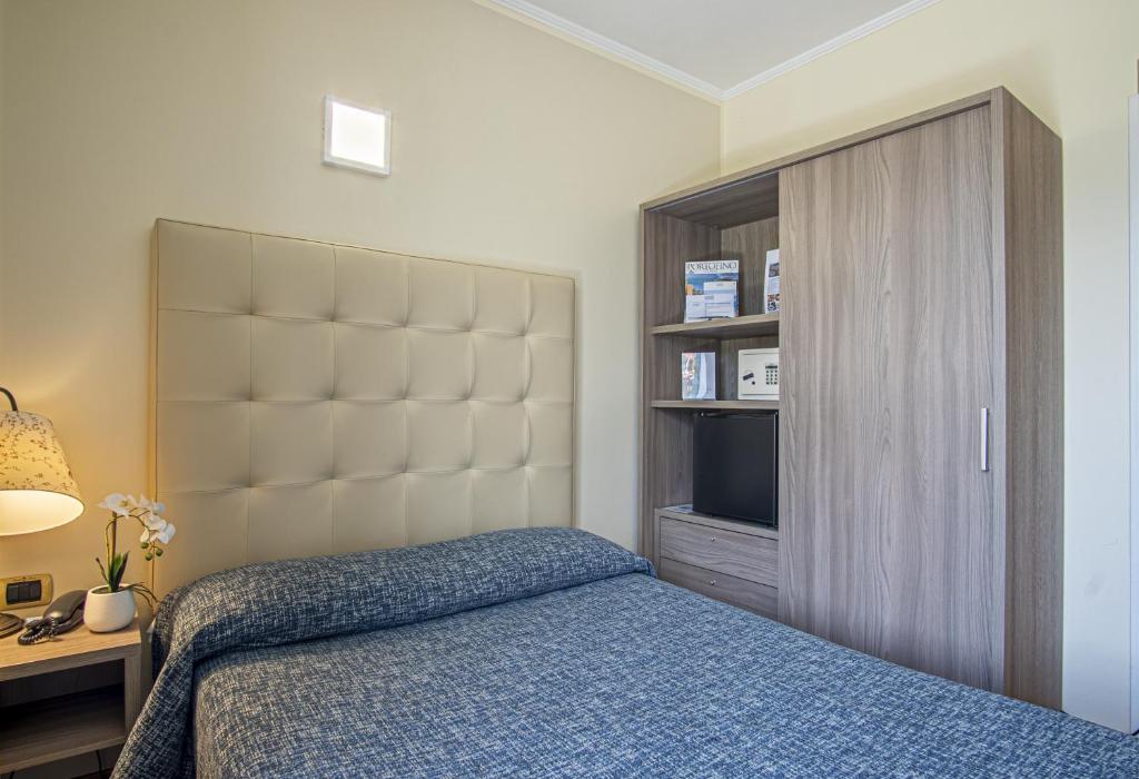 Кровать или кровати в номере Grande Albergo