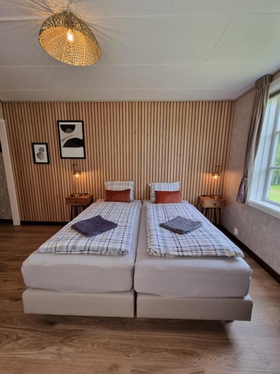 Кровать или кровати в номере Strandås B&B