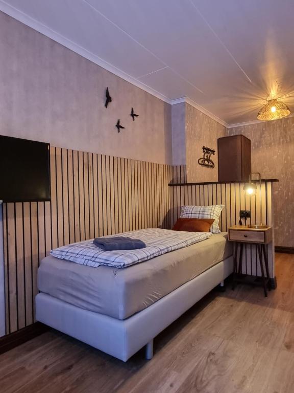 Кровать или кровати в номере Strandås B&B
