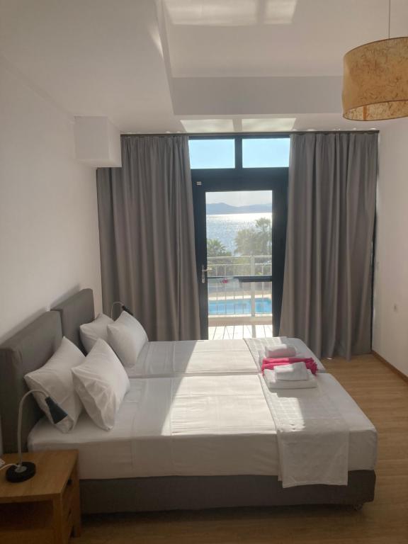 Postel nebo postele na pokoji v ubytování Almyra Holiday Village