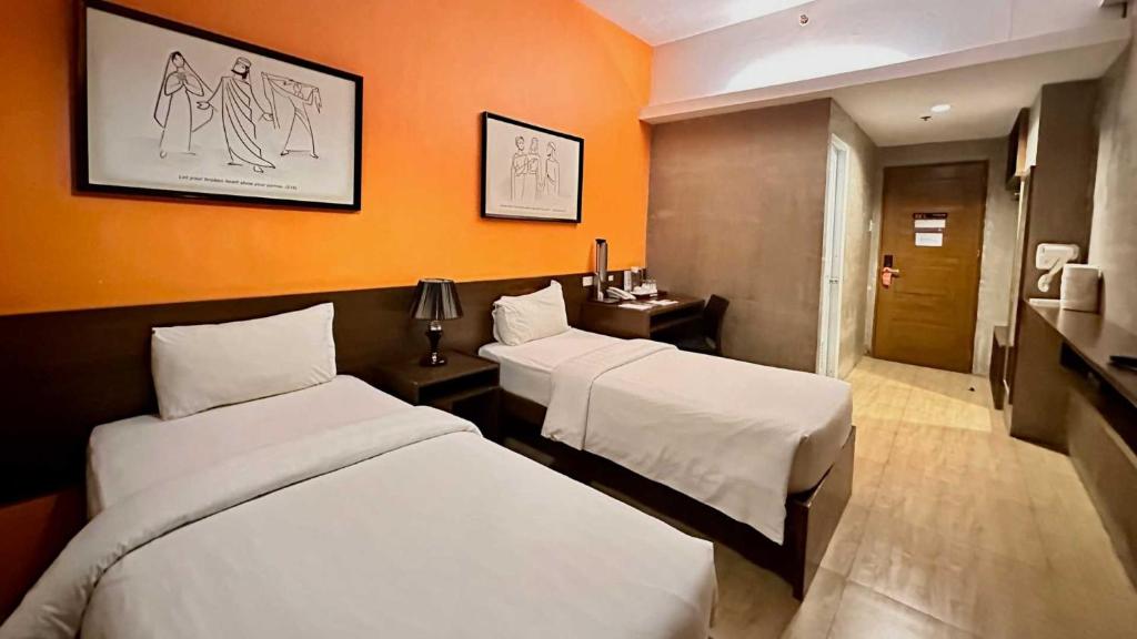 Postel nebo postele na pokoji v ubytování Big Hotel