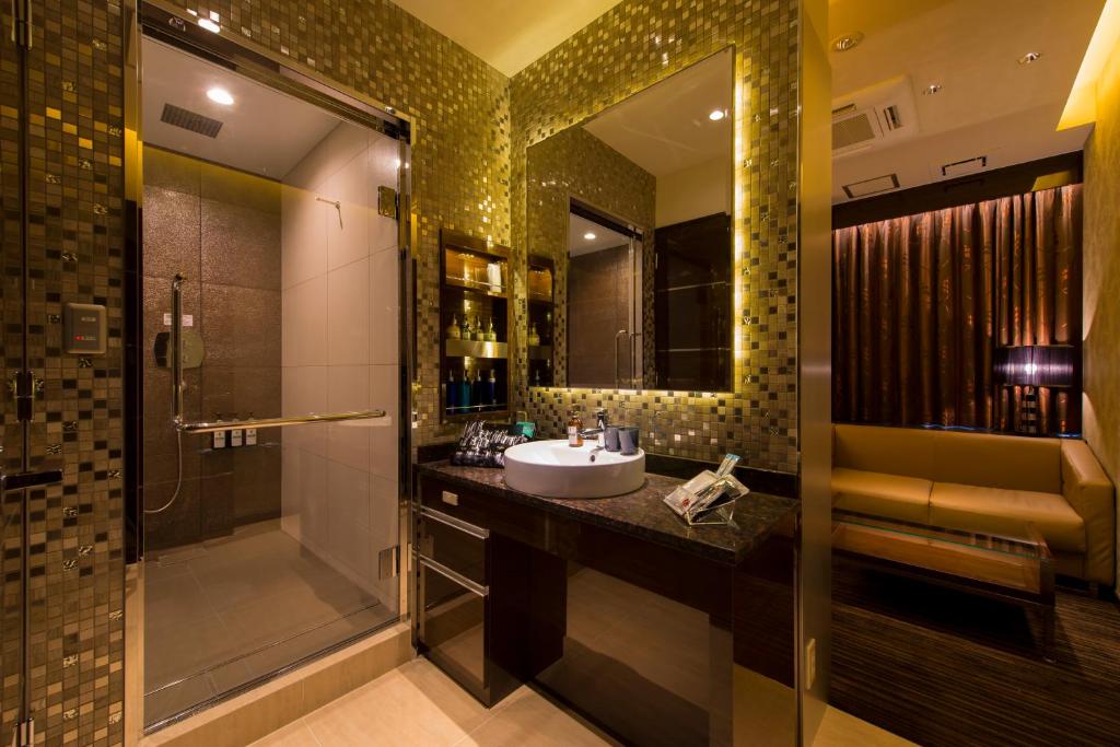Koupelna v ubytování HOTEL GLANZ CASCATA