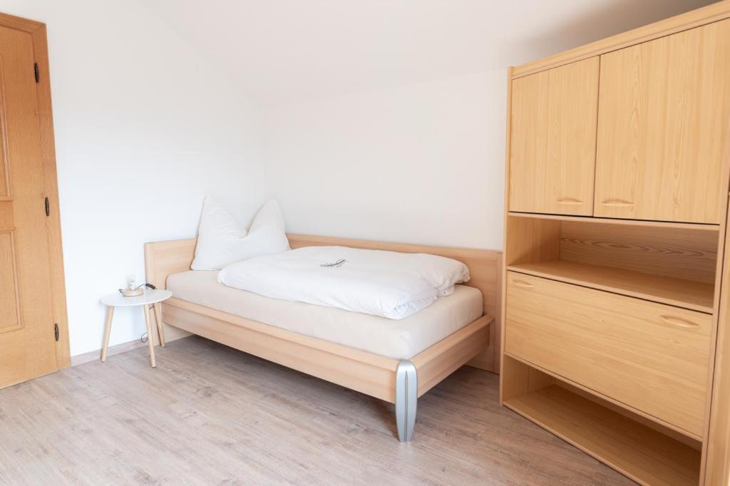 Voodi või voodid majutusasutuse NaturparkResort Haus Geigenkogel toas