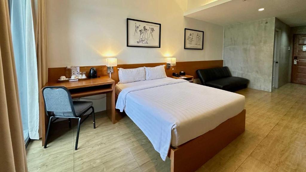 Postel nebo postele na pokoji v ubytování Big Hotel