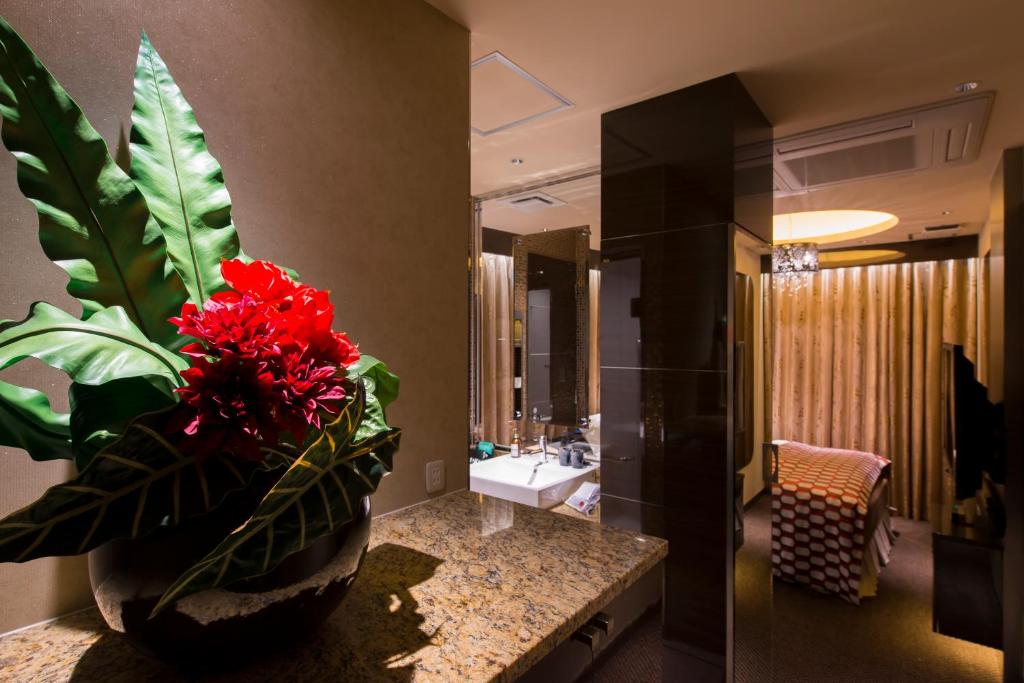 Koupelna v ubytování HOTEL GLANZ CASCATA