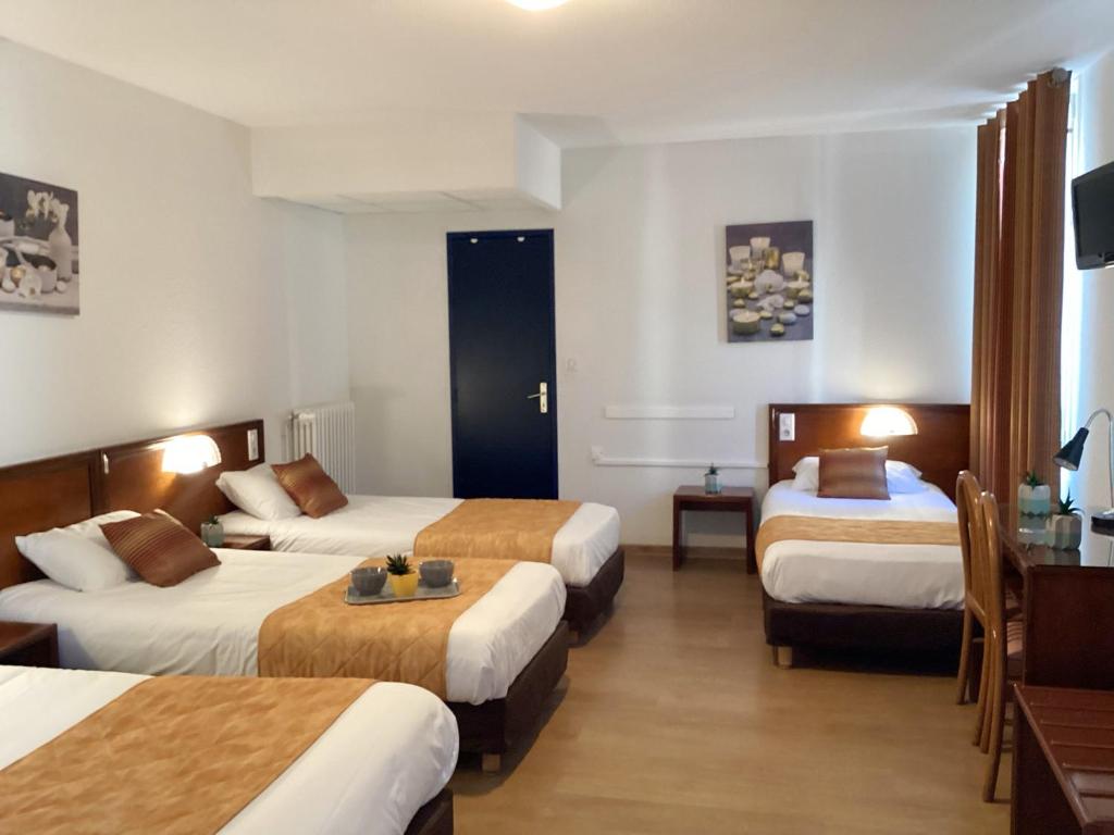 Postel nebo postele na pokoji v ubytování Hôtel Angelic