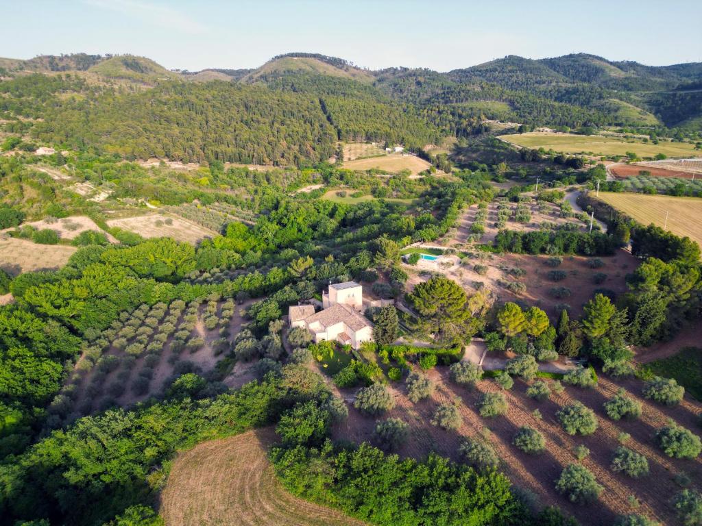 an aerial view of a house in the mountains at Villa Santa Margherita in Chiaramonte Gulfi