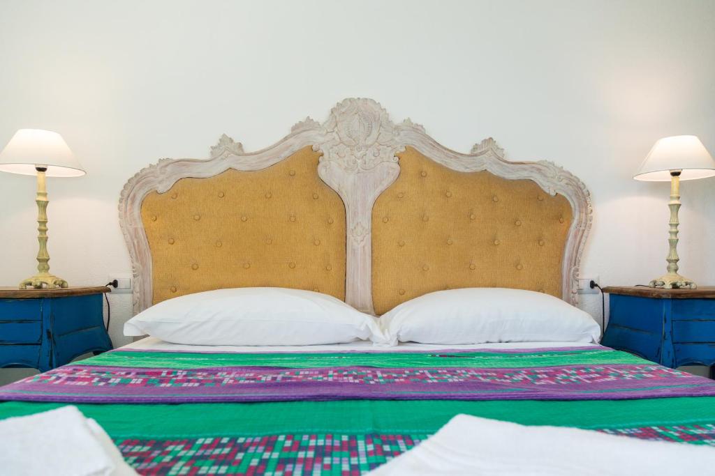 Postel nebo postele na pokoji v ubytování Helios Hotel