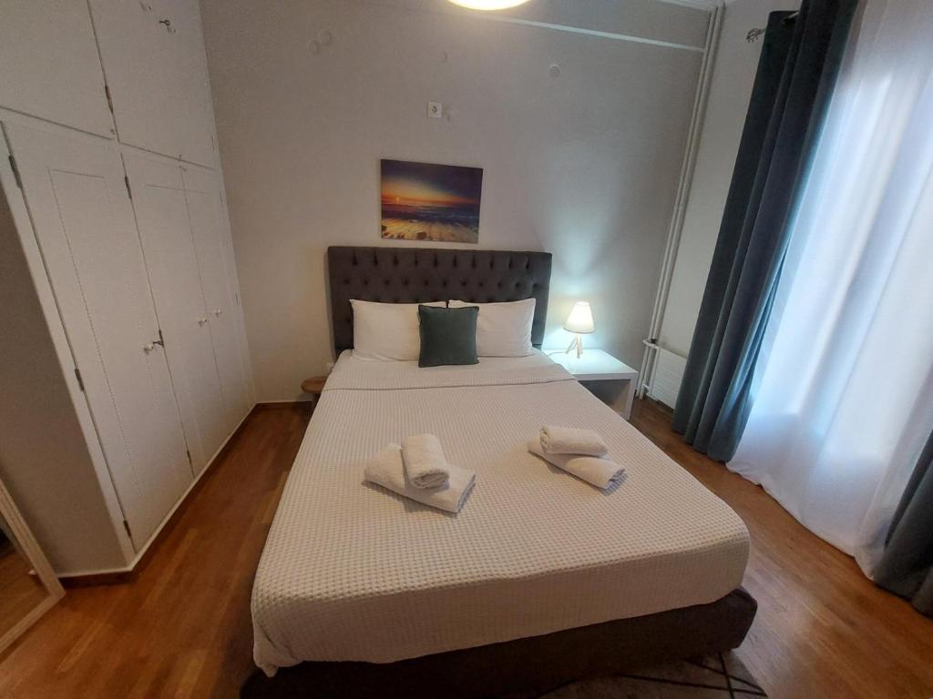Posteľ alebo postele v izbe v ubytovaní Athens Apartment Nina, Next To The Metro Station