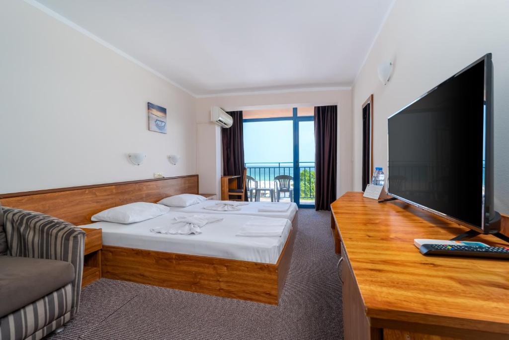 TV a/nebo společenská místnost v ubytování MPM Hotel Condor - All Inclusive Light