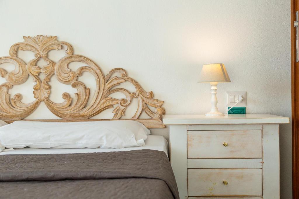Postel nebo postele na pokoji v ubytování Helios Hotel