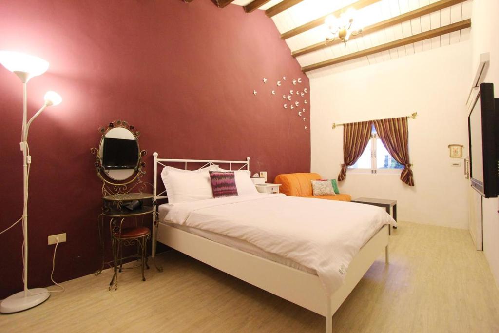 Postel nebo postele na pokoji v ubytování Grass B&B