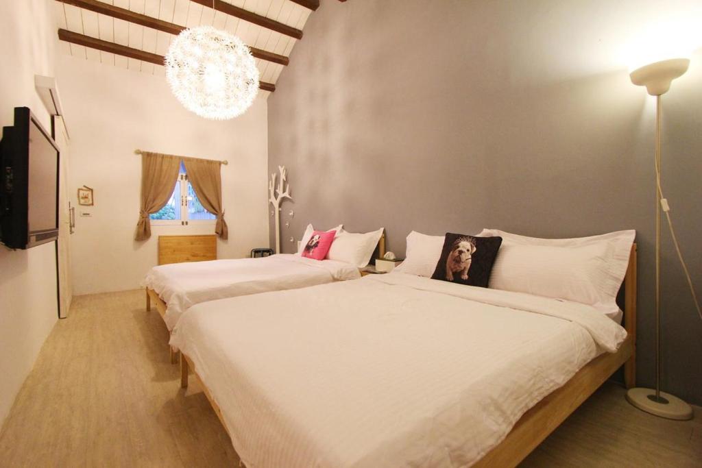 Postel nebo postele na pokoji v ubytování Grass B&B