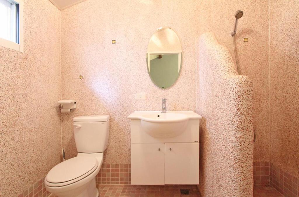 Koupelna v ubytování Grass B&B