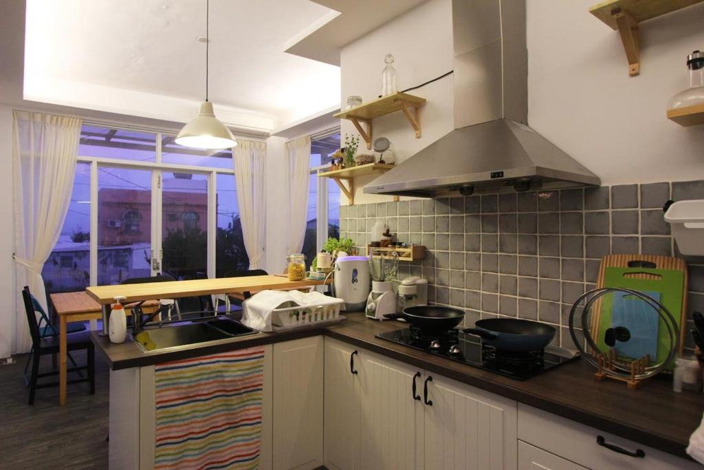 Kuchyň nebo kuchyňský kout v ubytování Grass B&B