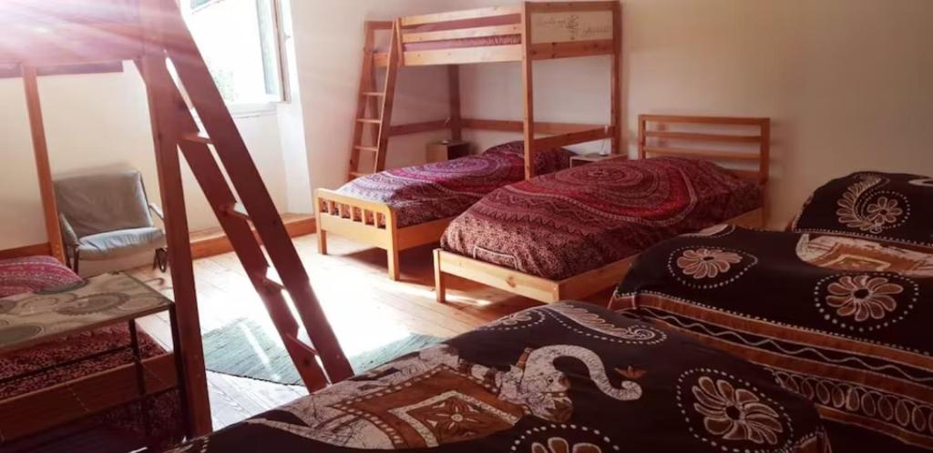 Postel nebo postele na pokoji v ubytování La Louve Chez Valérie