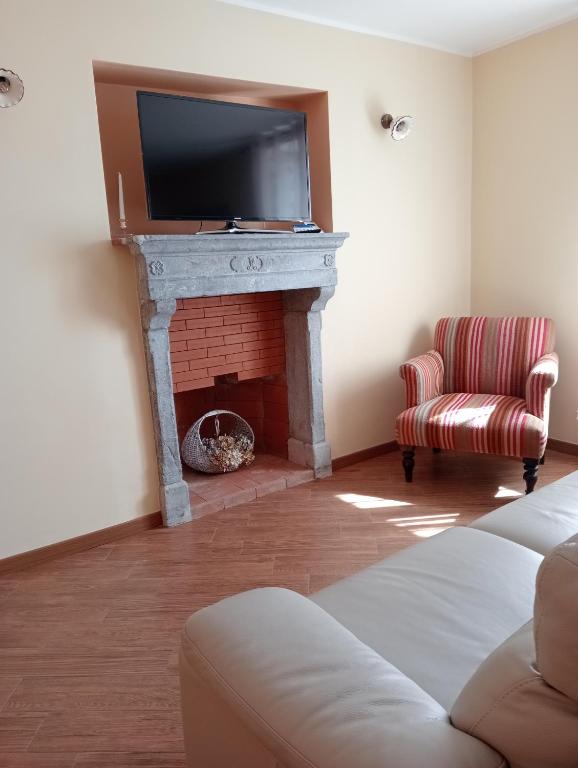 TV a/nebo společenská místnost v ubytování B&B A TAVERNA
