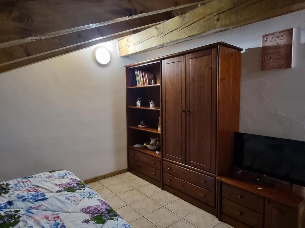Postel nebo postele na pokoji v ubytování Camera Adamello 2