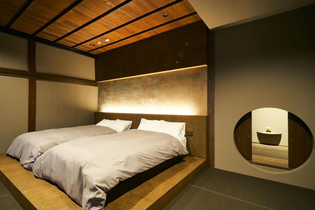 Letto o letti in una camera di Bed and Craft