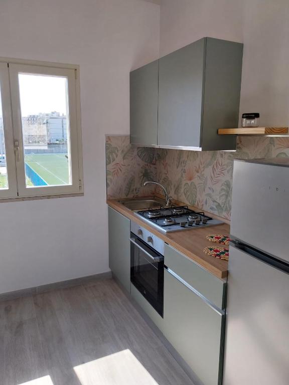 Kuchnia lub aneks kuchenny w obiekcie Appartamenti Via Venezia