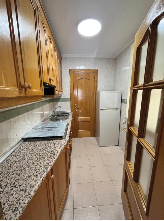 Kuchyň nebo kuchyňský kout v ubytování PISO Guadix MB
