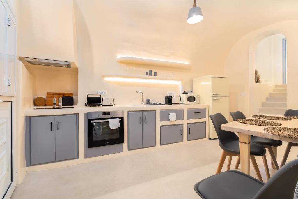 Kuchyň nebo kuchyňský kout v ubytování Eolithos Exclusive Suites