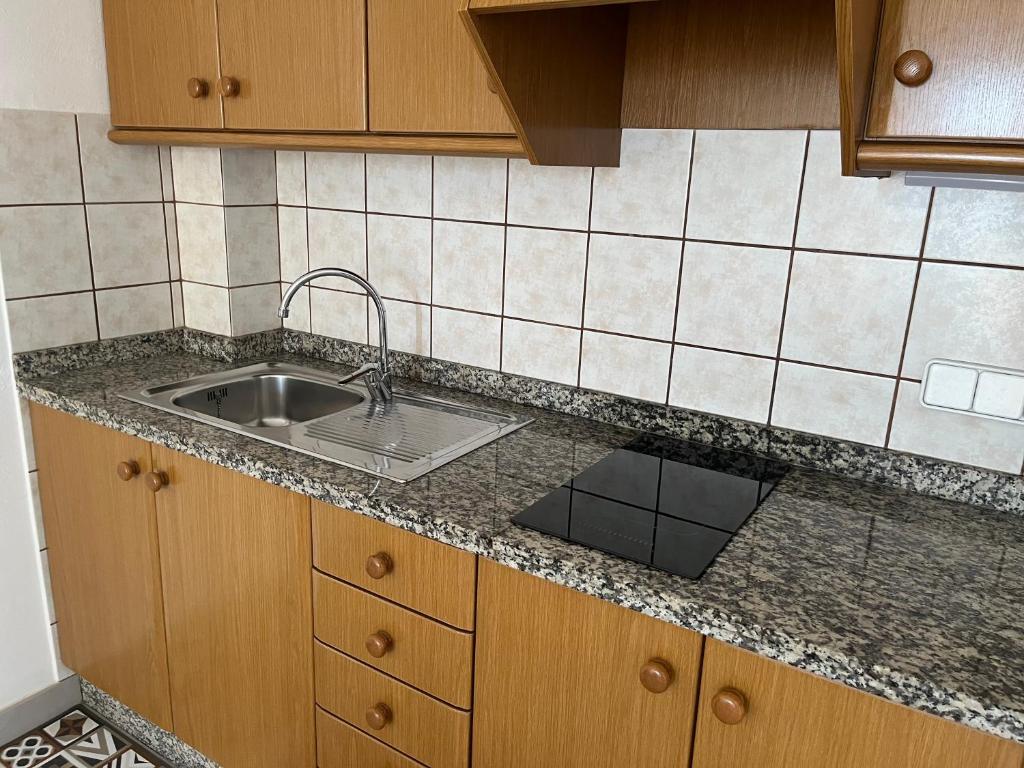 Kuchyň nebo kuchyňský kout v ubytování Apartamentos Mar i Vent Puerto de La Savina Formentera