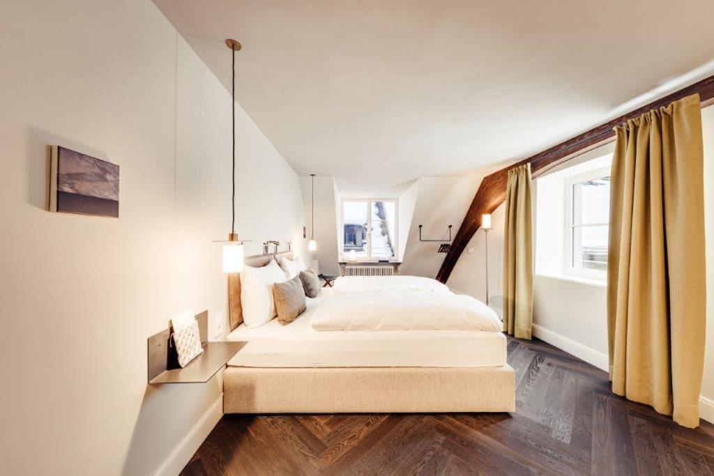 Postel nebo postele na pokoji v ubytování Boutique Hotel das TSCHOFEN