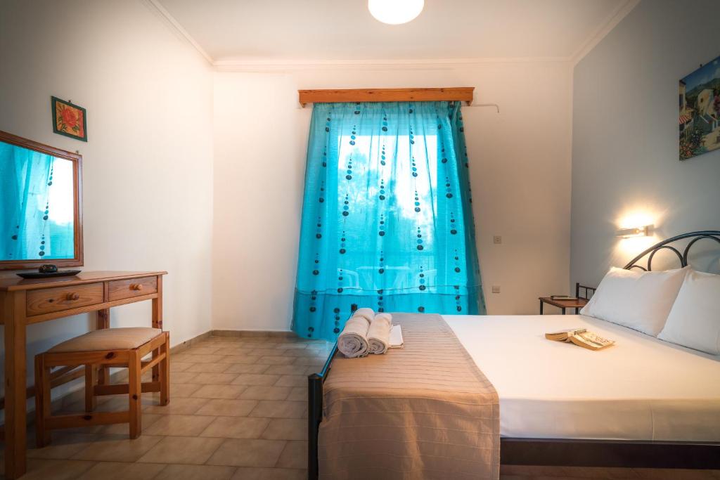 Letto o letti in una camera di Tota Studios