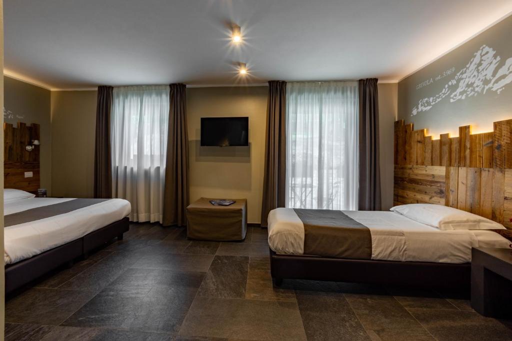 Postel nebo postele na pokoji v ubytování Monte Emilius