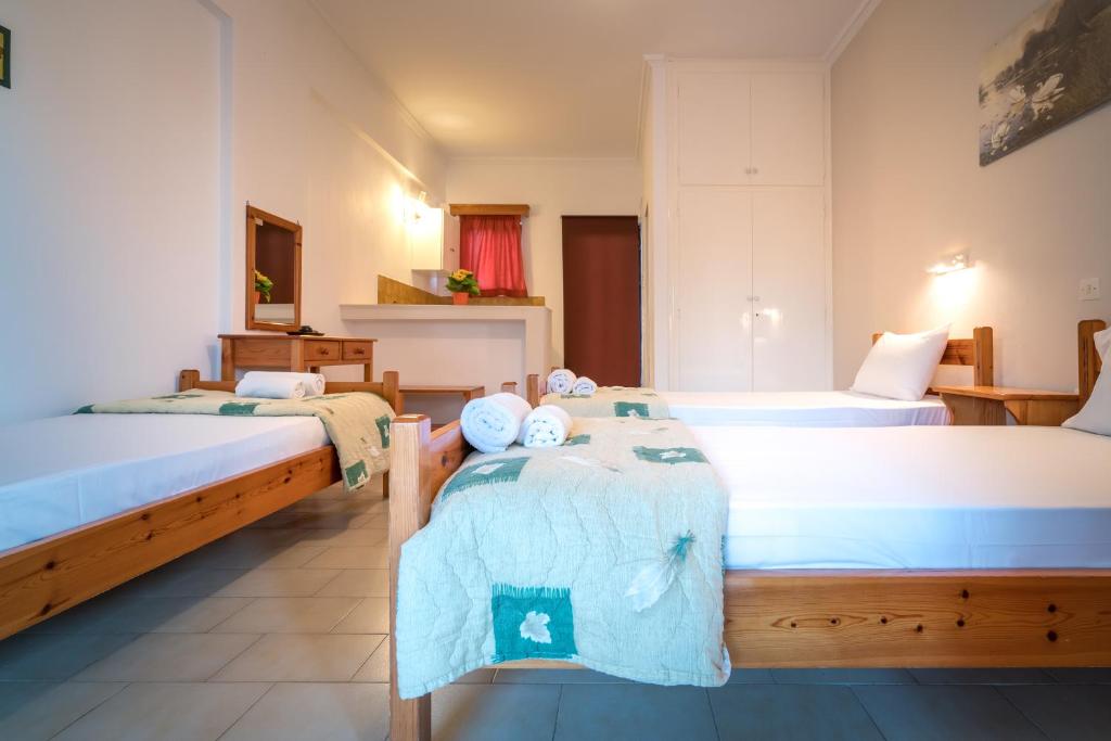 Letto o letti in una camera di Tota Studios
