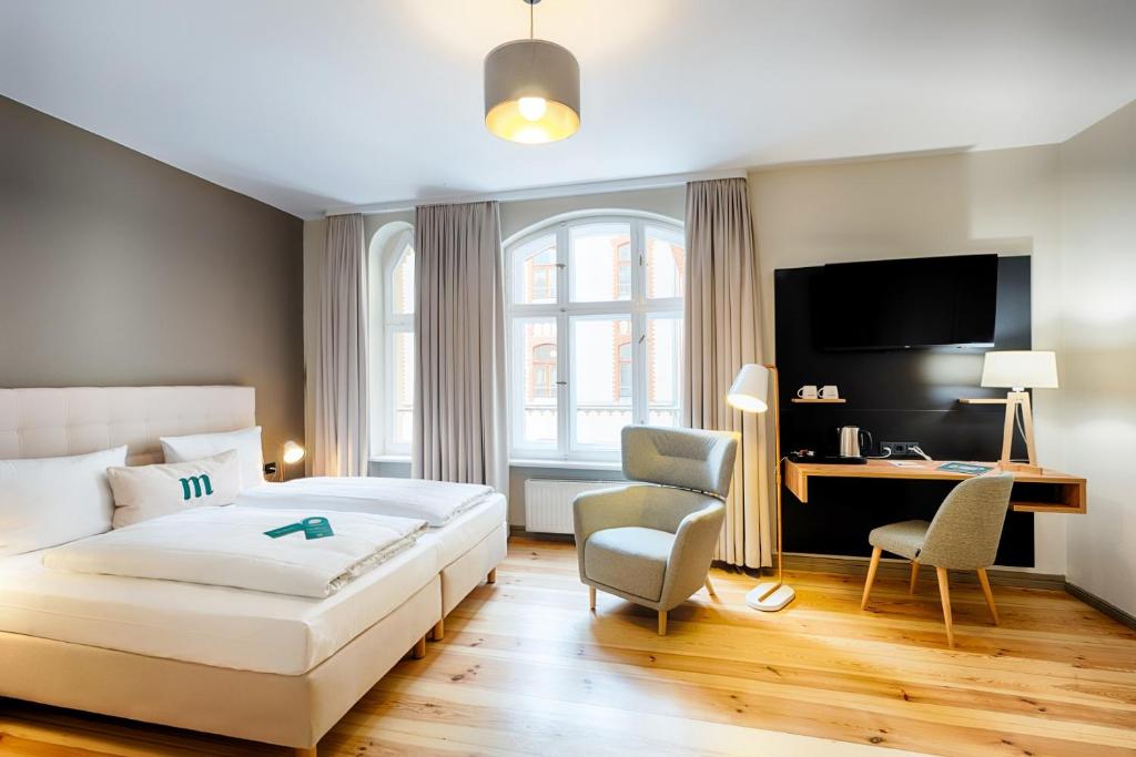 Postel nebo postele na pokoji v ubytování martas Hotel Berlin-Mitte