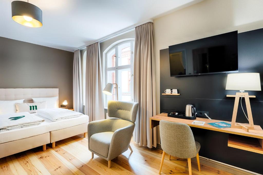 Postel nebo postele na pokoji v ubytování martas Hotel Berlin-Mitte