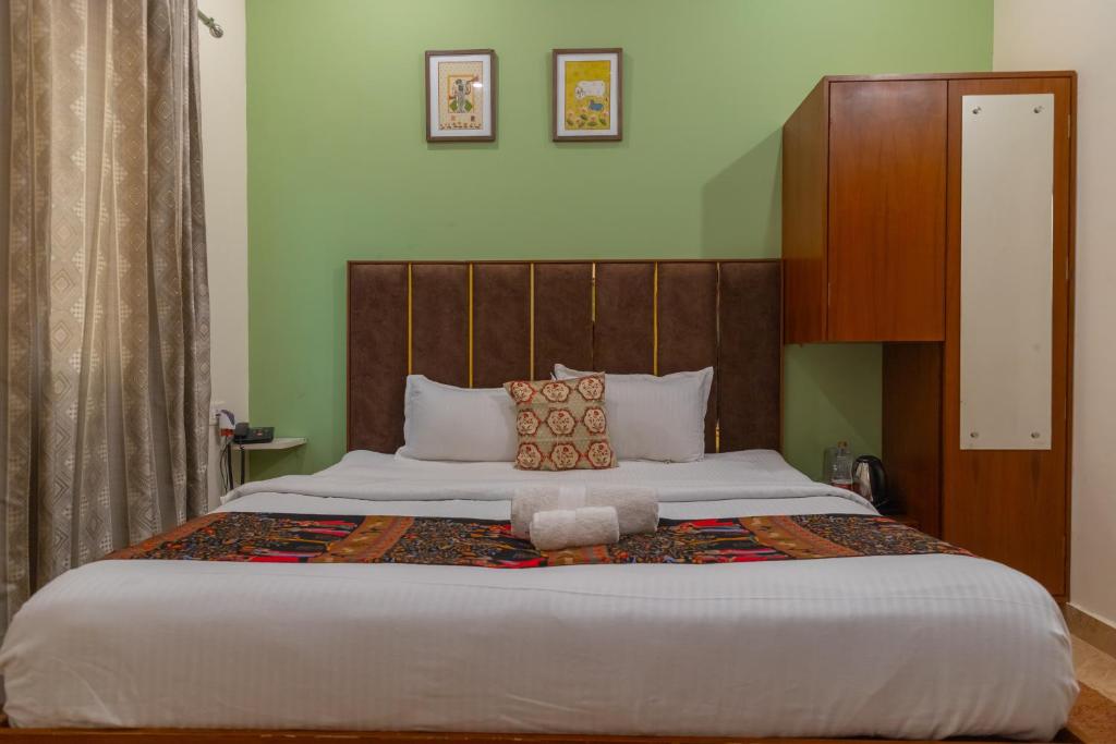 Postel nebo postele na pokoji v ubytování Hotel Sethi Legacy