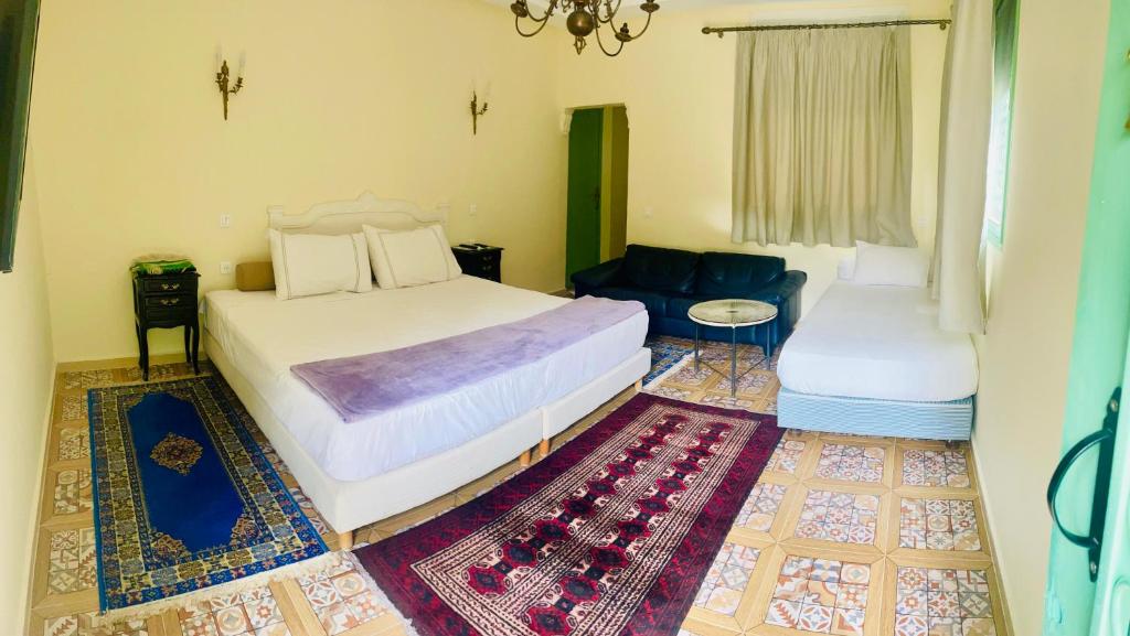 Postel nebo postele na pokoji v ubytování Villa Baddi Marrakech
