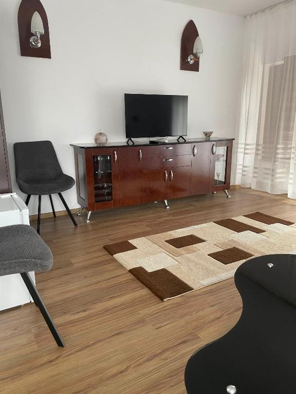 TV a/nebo společenská místnost v ubytování Motel Maestro