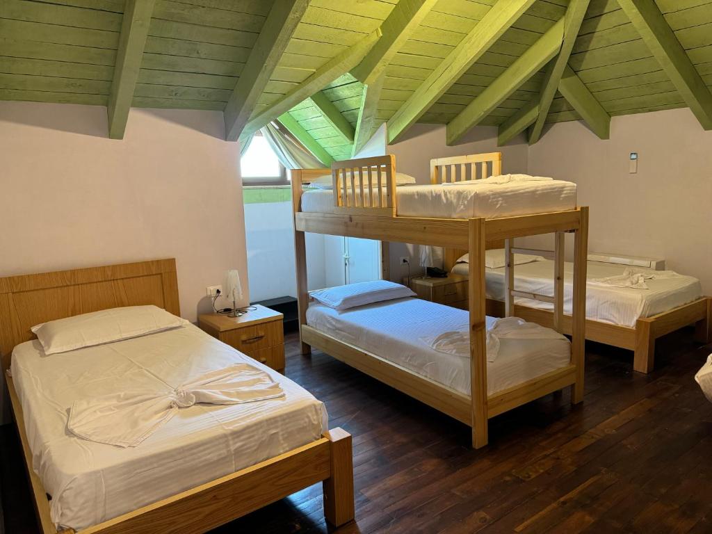 Postel nebo postele na pokoji v ubytování Resort Nord Park
