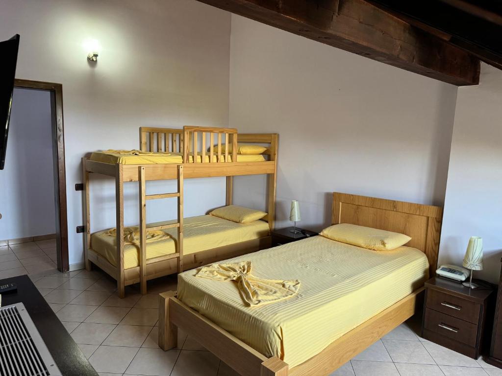 Postel nebo postele na pokoji v ubytování Resort Nord Park