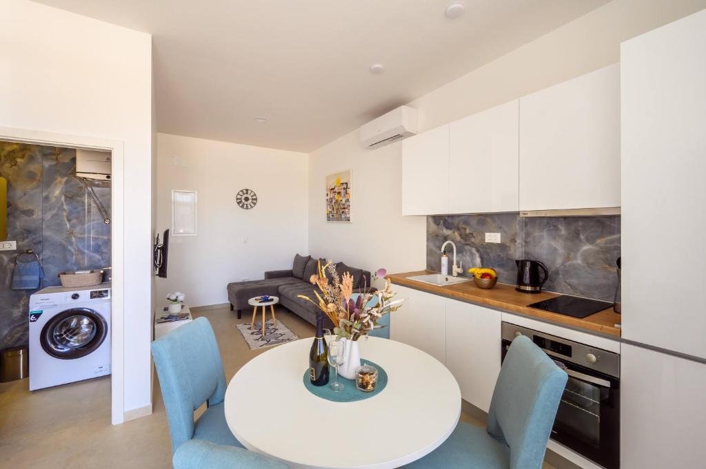 Kuchyň nebo kuchyňský kout v ubytování Apartmani Boras
