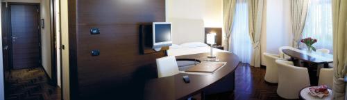 Posteľ alebo postele v izbe v ubytovaní Hotel Habitat