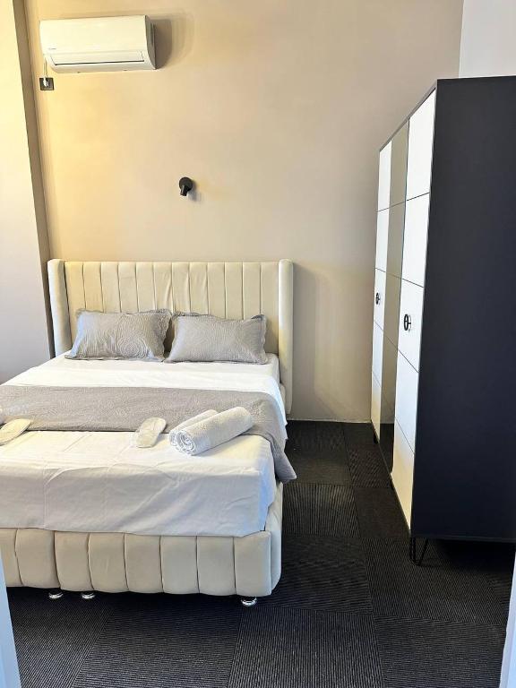 Postel nebo postele na pokoji v ubytování Hotel black sea