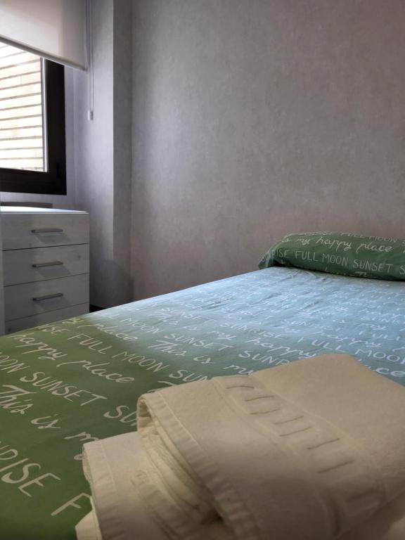 Postel nebo postele na pokoji v ubytování Albergue Residencia Larraona