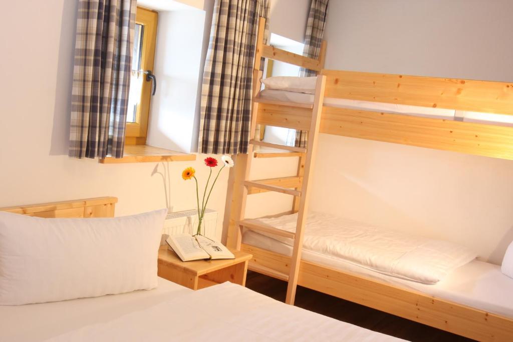 Postel nebo postele na pokoji v ubytování Arberschutzhaus