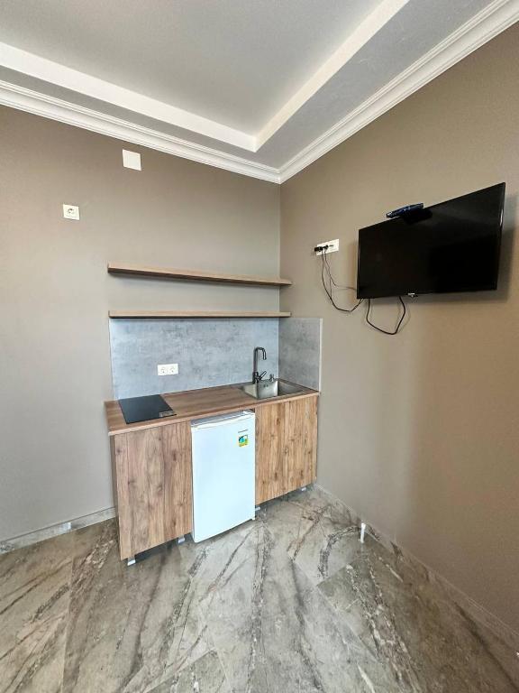 Kuchyň nebo kuchyňský kout v ubytování Hotel black sea